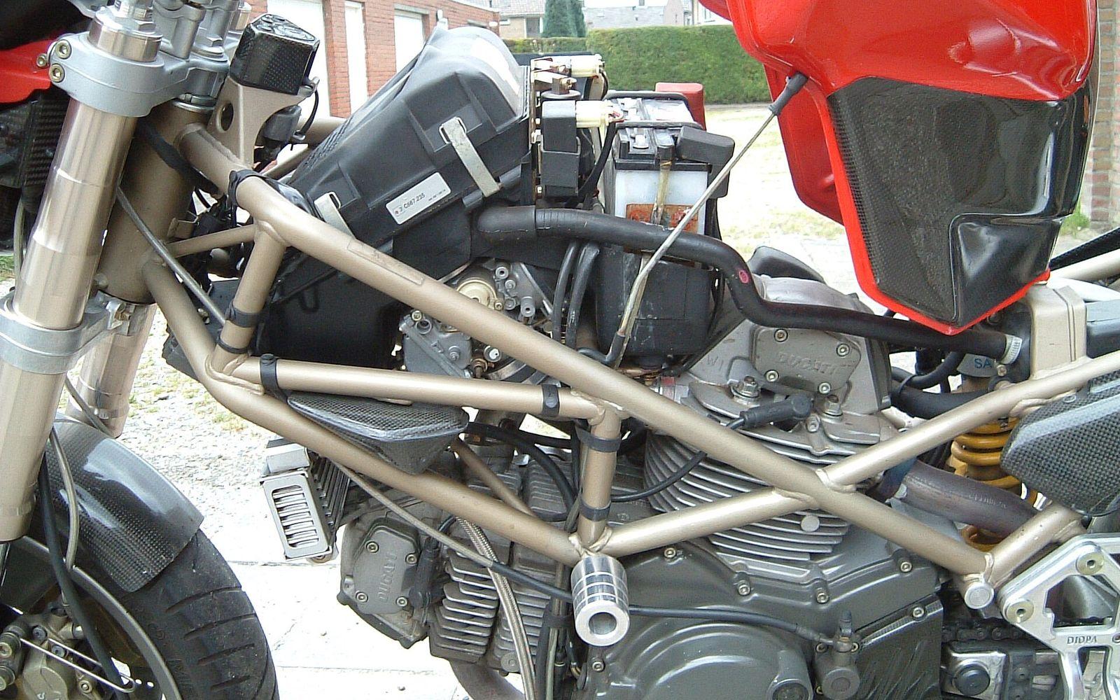 Close-up of a tubular steel trellis frame on a Ducati Monster motorcycle